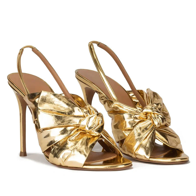 🍒Metalic bow shiny gold shoes occasion stilettoe sandals sling back thin high-heeled party wear                      🍒        High wedge platform shoe sling back open toe sandal with front bow  Gonna Get Golden Oldie Golds