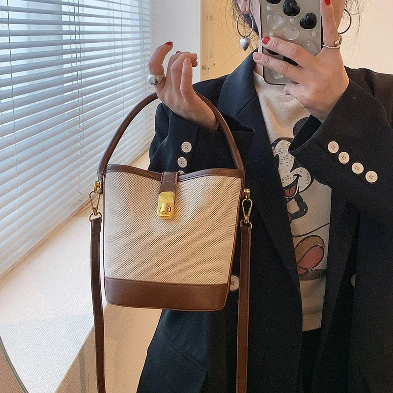 🍒Womens canvas bucket bag fashion light handbags light twist close crossbody bag smart casual accesories design purse Nifty Twister