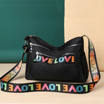 🍒Womens handbag oxford fabric bag large capacity crossbody with multiple compartments fashion accessory casual carry bag with colourful font Get A Handle On Love