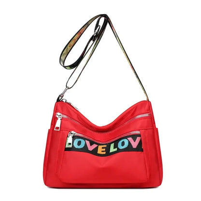 🍒Womens handbag oxford fabric bag large capacity crossbody with multiple compartments fashion accessory casual carry bag with colourful font Get A Handle On Love