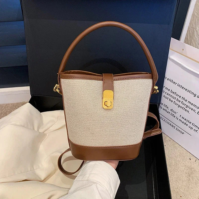 🍒Womens canvas bucket bag fashion light handbags light twist close crossbody bag smart casual accesories design purse Nifty Twister