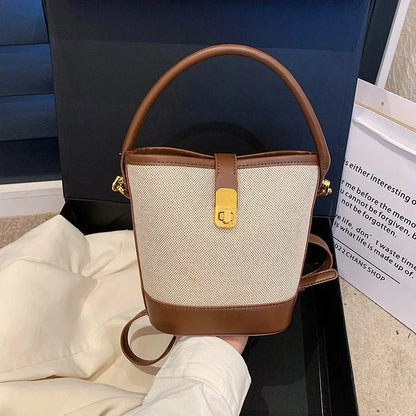 🍒Womens canvas bucket bag fashion light handbags light twist close crossbody bag smart casual accesories design purse Nifty Twister