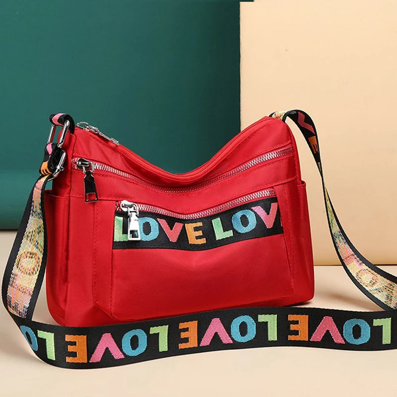 🍒Womens handbag oxford fabric bag large capacity crossbody with multiple compartments fashion accessory casual carry bag with colourful font Get A Handle On Love